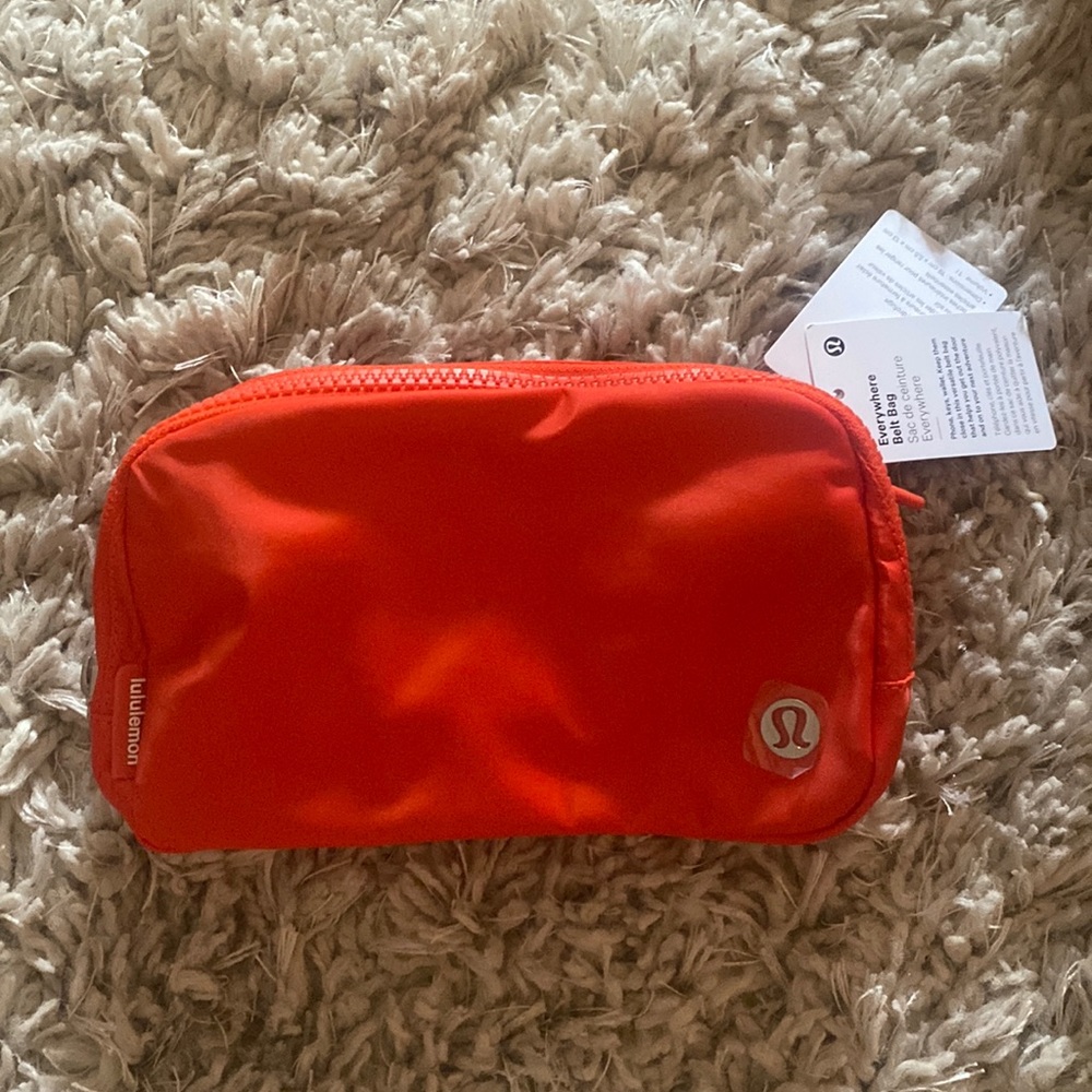 Lululemon solar red belt bag with logo